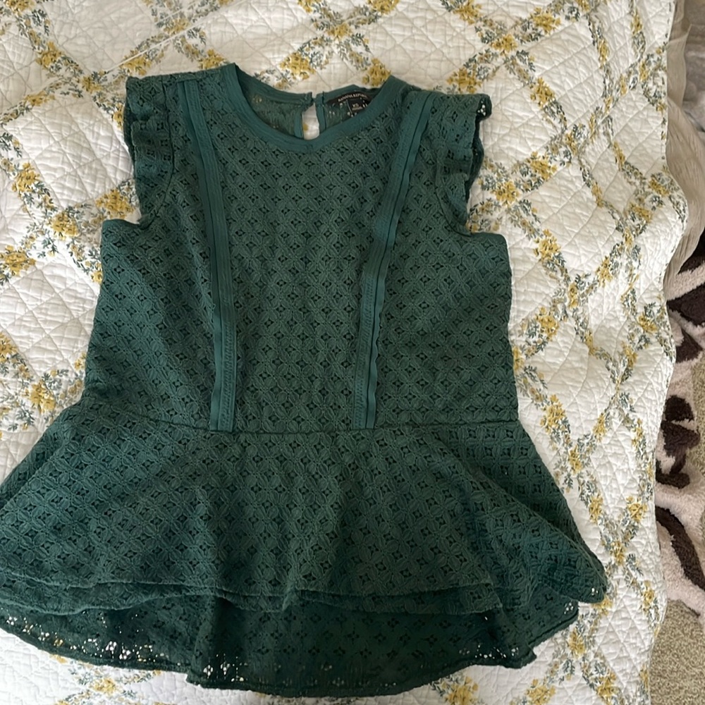 This is an emerald green top from Banana Republic.